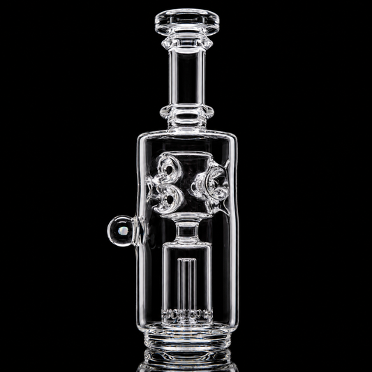 A clear Puffco-compatible Peak glass top with a fab perc