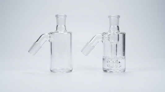 A dry ash catcher next to a wet ash catcher with a percolator and water