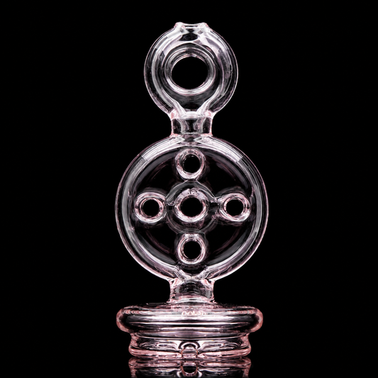 A pink swiss perc glass top for a Puffco-compatible e-rig